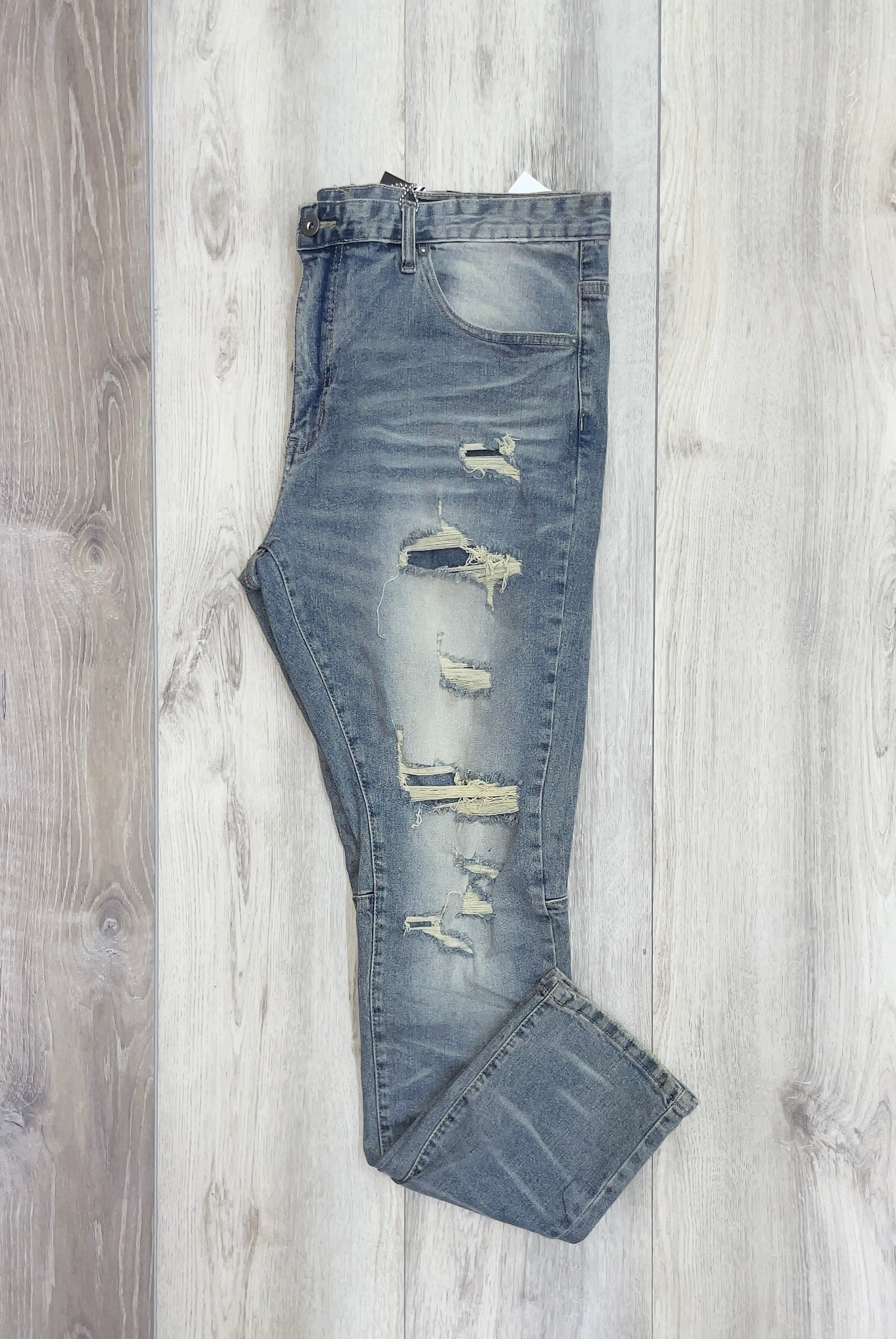 LIGHT BLUE RIPPED JEANS