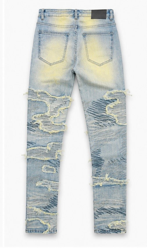 CONCEPT LIGHT WASH DISTRESSED SCRIBBLE JEANS