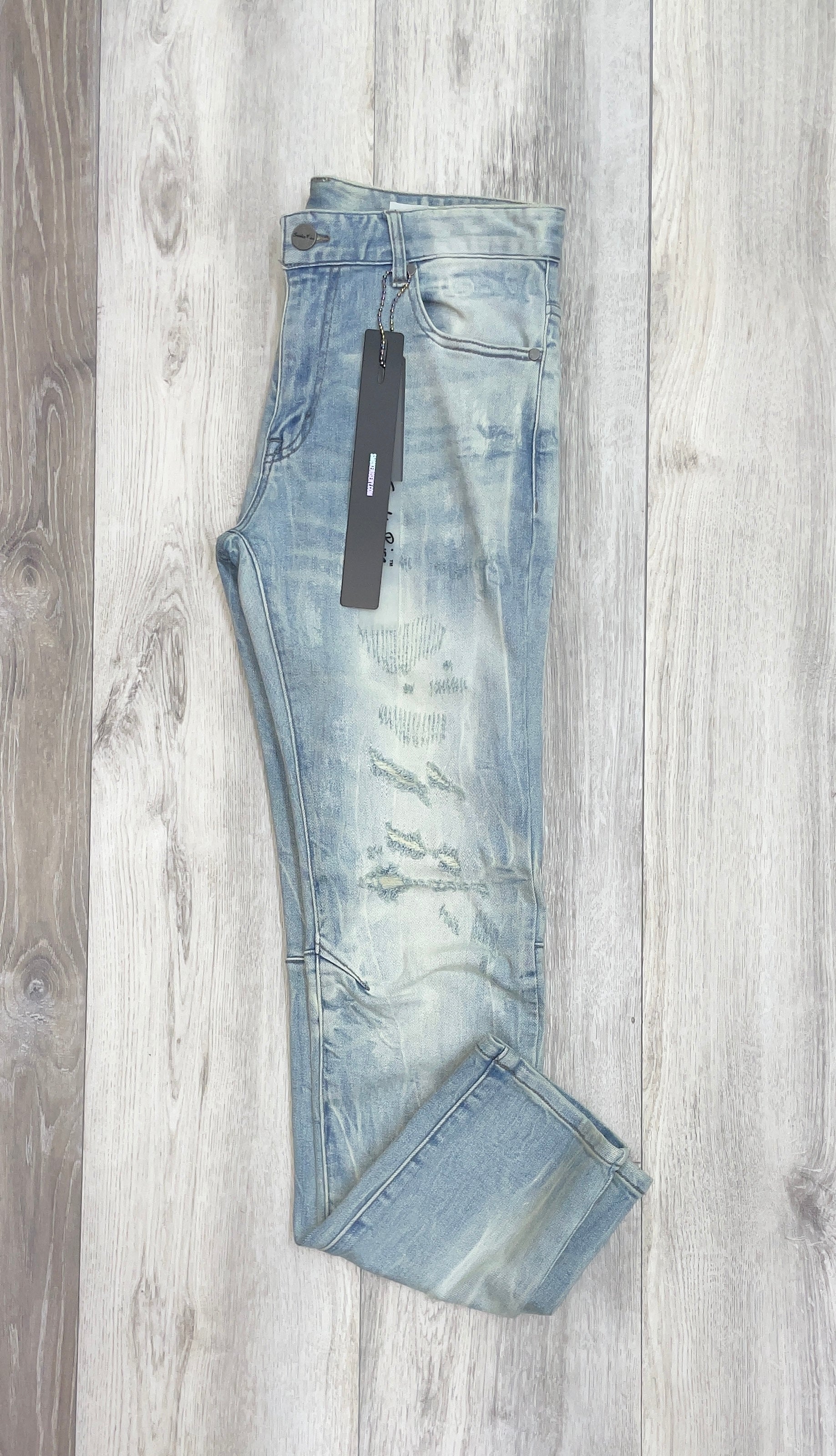 LIGHT BLUE DISTRESSED JEANS