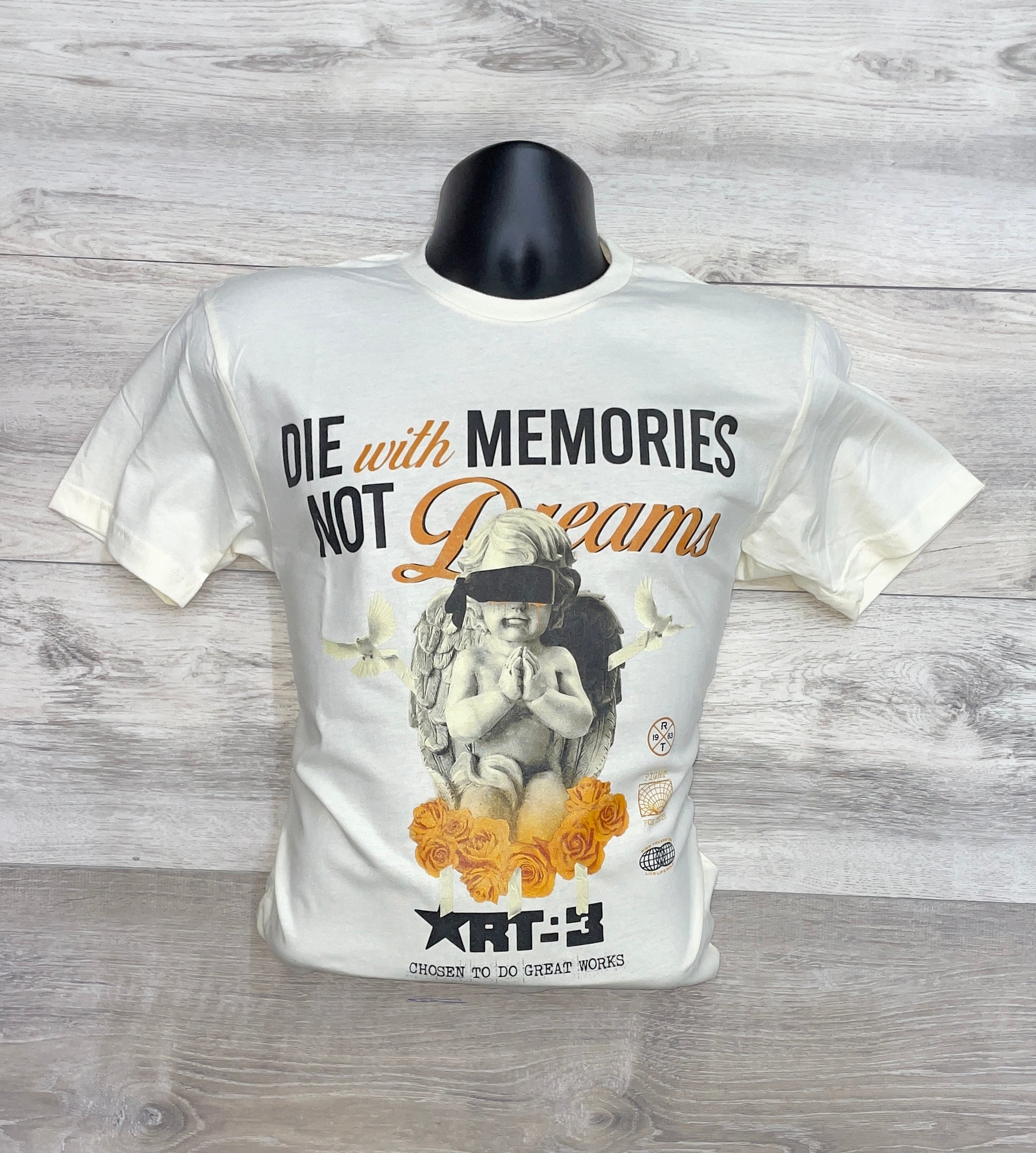 CREAM T-SHIRT WITH BLACK AND ORANGE PRINT