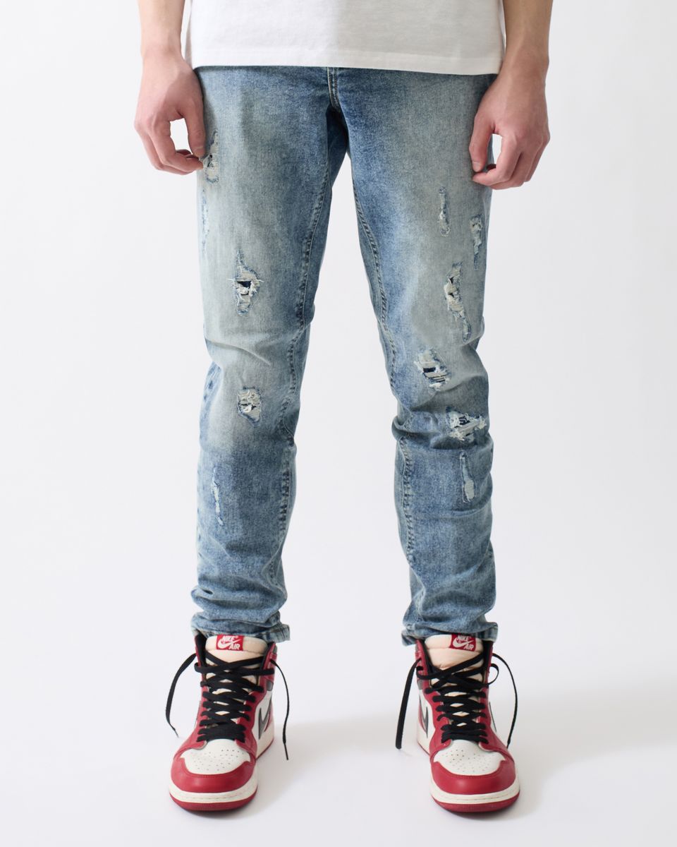 Reason Light Wash Distressed Skinny Jeans